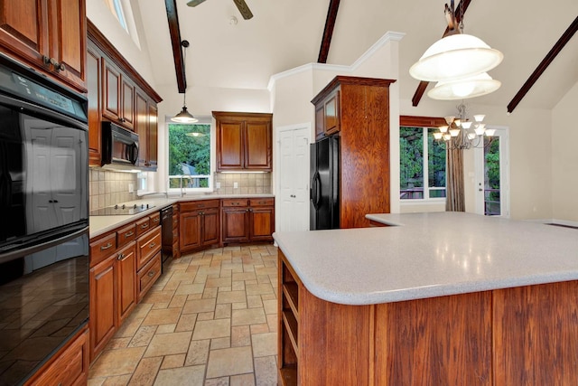 kitchen featuring pendant lighting, black appliances, vaulted ceiling with beams, and backsplash