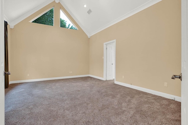 empty room with carpet floors, high vaulted ceiling, and crown molding