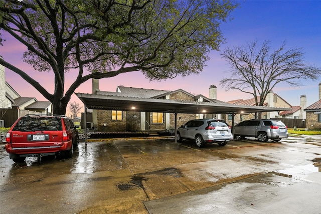 view of front of house featuring a carport