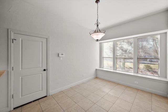 empty room with light tile patterned floors