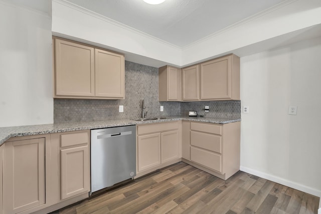 kitchen with sink, wood-type flooring, stainless steel dishwasher, and ornamental molding