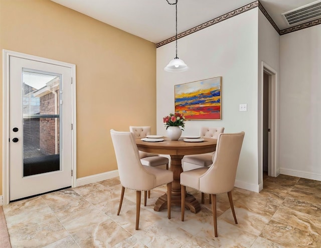 dining area with visible vents and baseboards