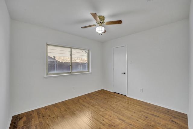 5400 Gregory Dr, Flower Mound, TX 75028 - unfurnished room featuring wood finished floors, baseboards, and a ceiling fan
