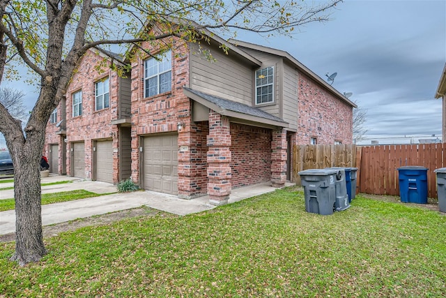 view of property exterior with a garage and a lawn