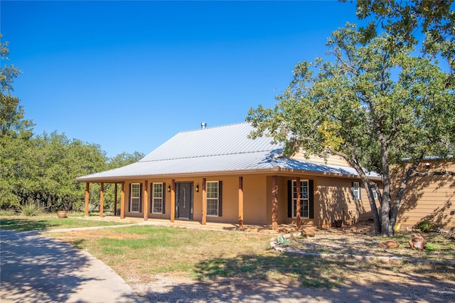 country-style home with covered porch