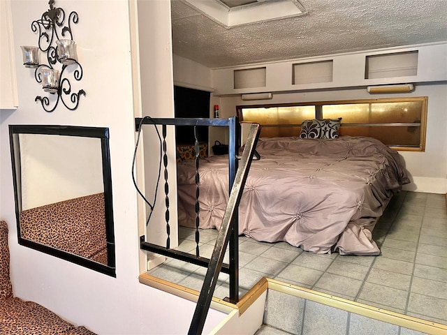 bedroom with a textured ceiling