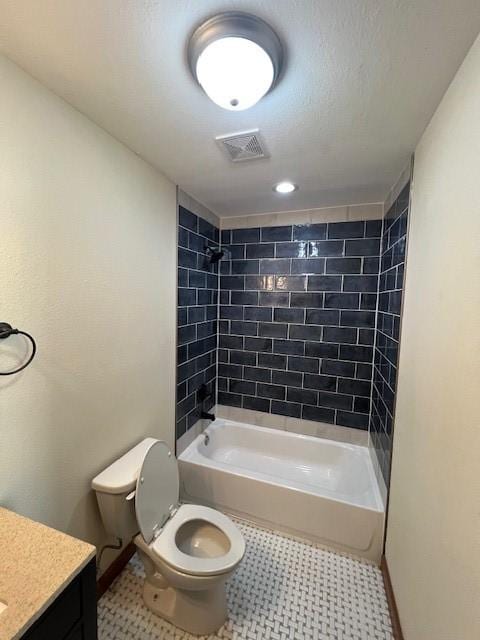 full bathroom featuring toilet, vanity, visible vents, baseboards, and tub / shower combination