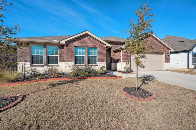 ranch-style home featuring a garage and a front yard