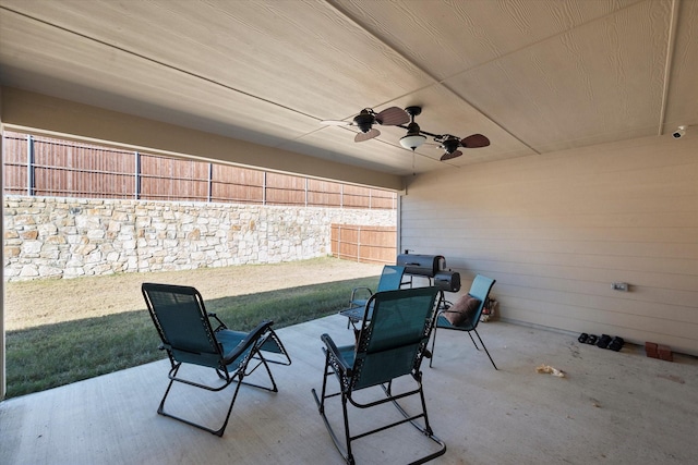 view of patio with ceiling fan