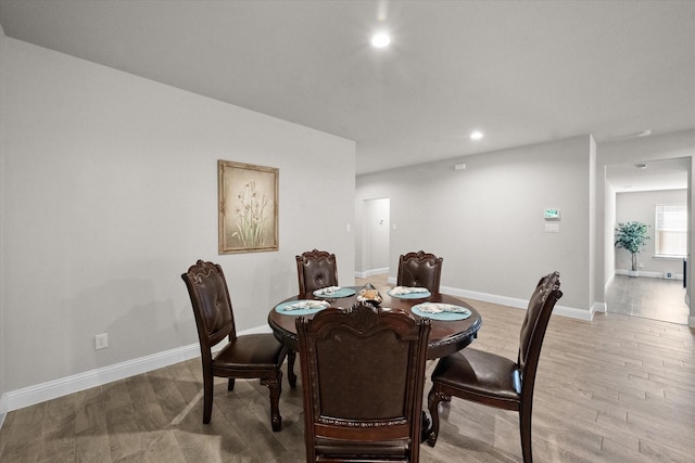 dining room featuring wood-type flooring