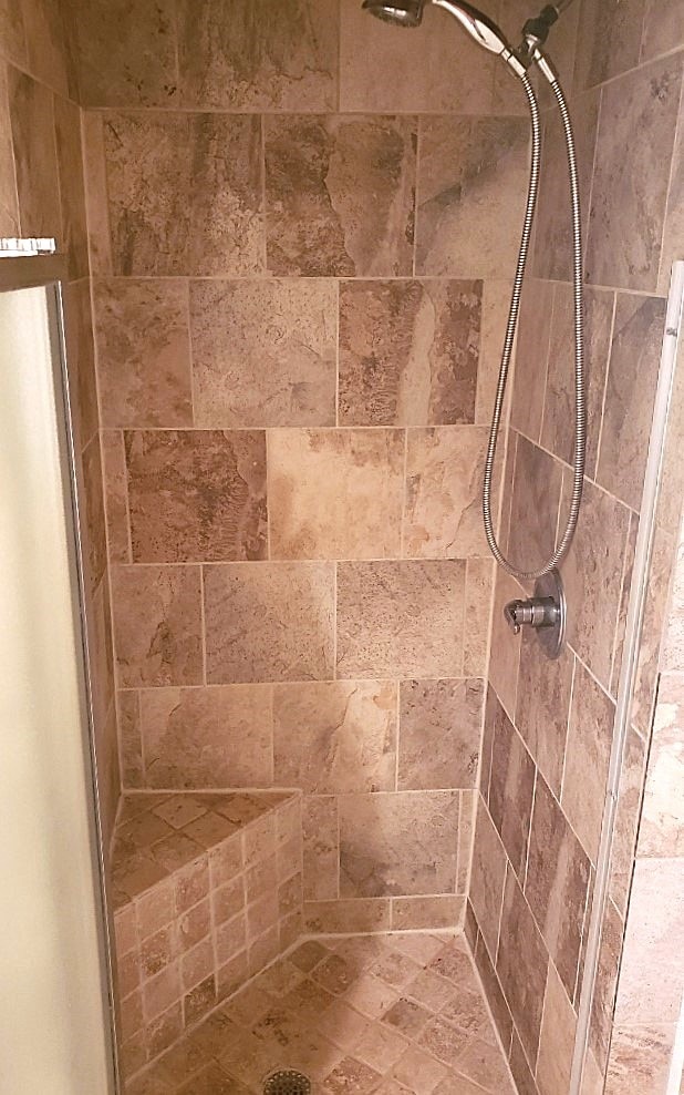 room details with a tile shower