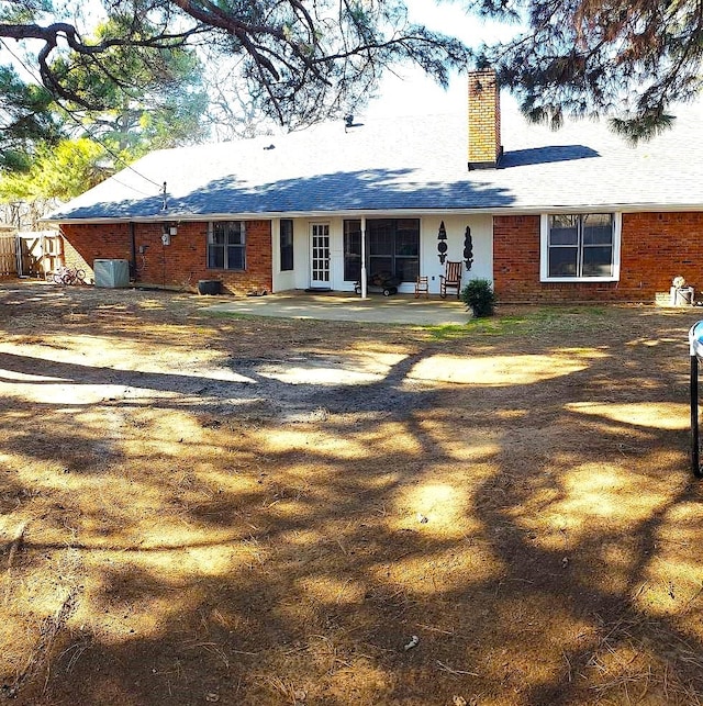 rear view of house with a patio