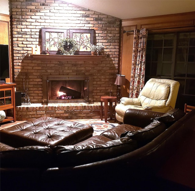 living room with a fireplace and vaulted ceiling