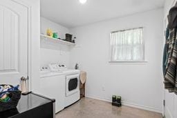 laundry room featuring washer and dryer