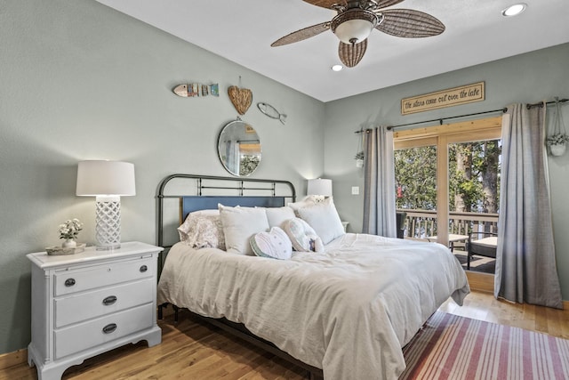 bedroom featuring access to exterior, light wood-type flooring, and ceiling fan