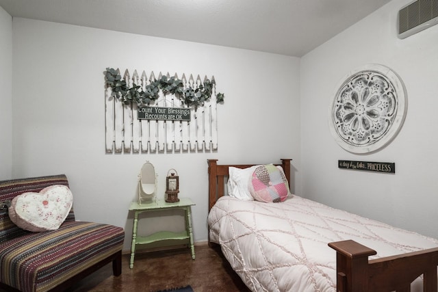 bedroom featuring dark carpet