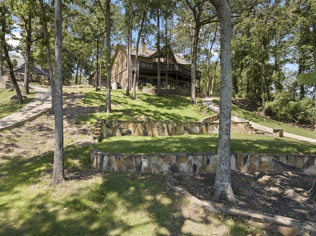 view of yard featuring a wooden deck