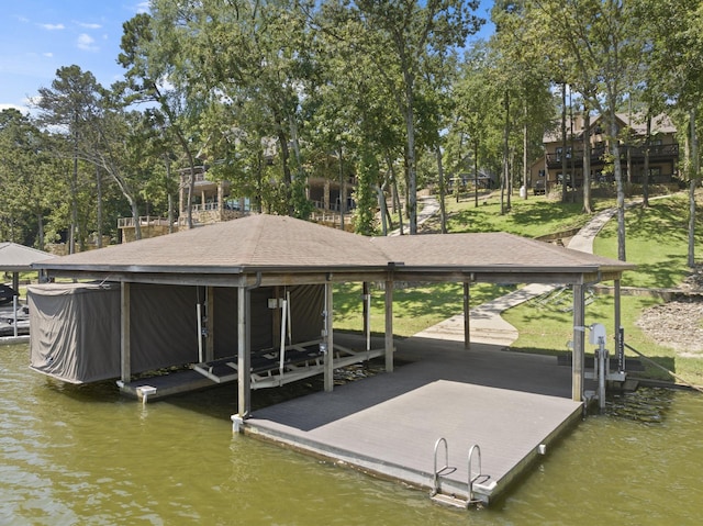 dock area featuring a water view