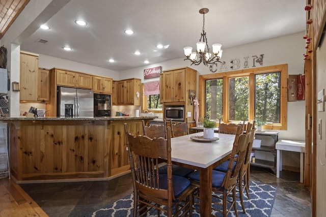 dining room with a chandelier