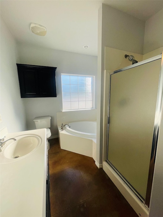 full bathroom with toilet, vanity, and shower with separate bathtub