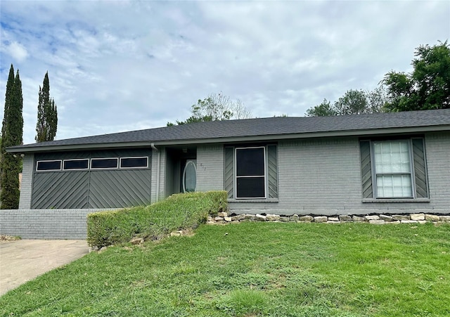 ranch-style house with a front lawn