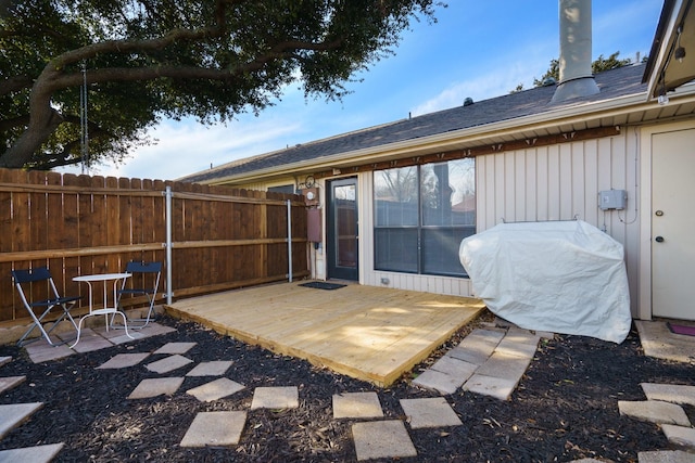 view of patio / terrace with a grill and a wooden deck