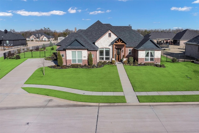 view of front of house with a front lawn