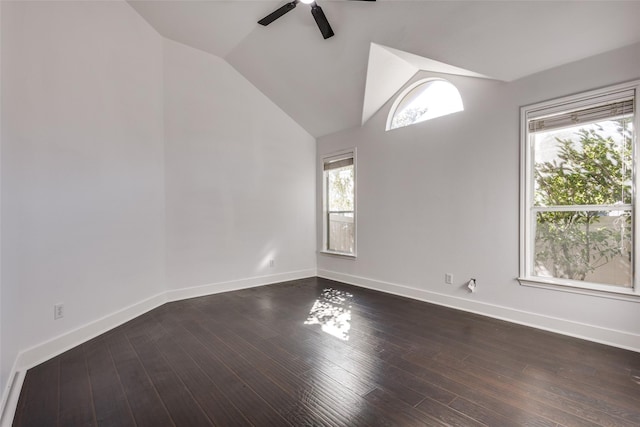 unfurnished room with ceiling fan, dark hardwood / wood-style floors, and lofted ceiling