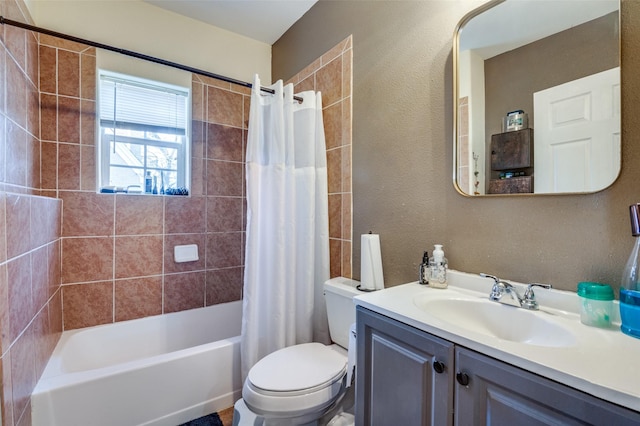 full bathroom with toilet, vanity, and shower / bath combo