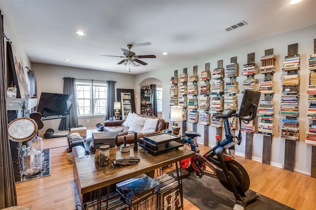 interior space with ceiling fan and light hardwood / wood-style flooring