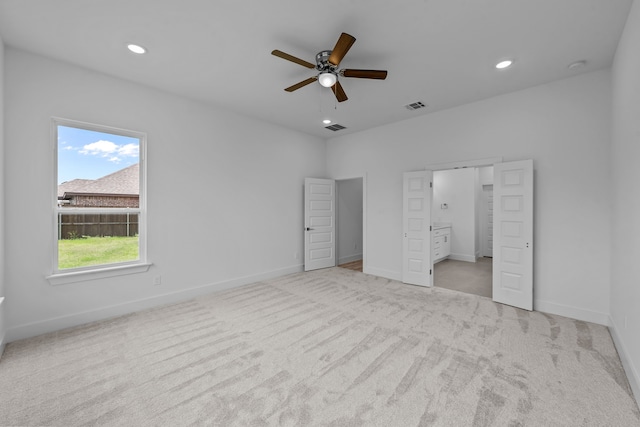 220 Magnolia Dr, Azle, TX 76020 - unfurnished bedroom featuring carpet floors, baseboards, recessed lighting, and connected bathroom