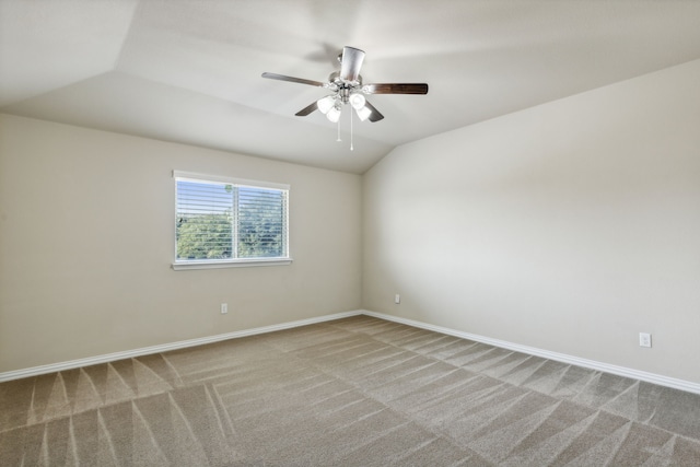 unfurnished room with carpet floors, ceiling fan, and lofted ceiling