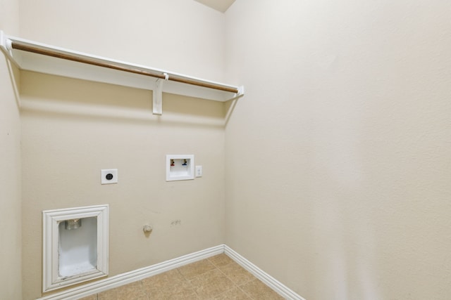 clothes washing area featuring electric dryer hookup, gas dryer hookup, and hookup for a washing machine