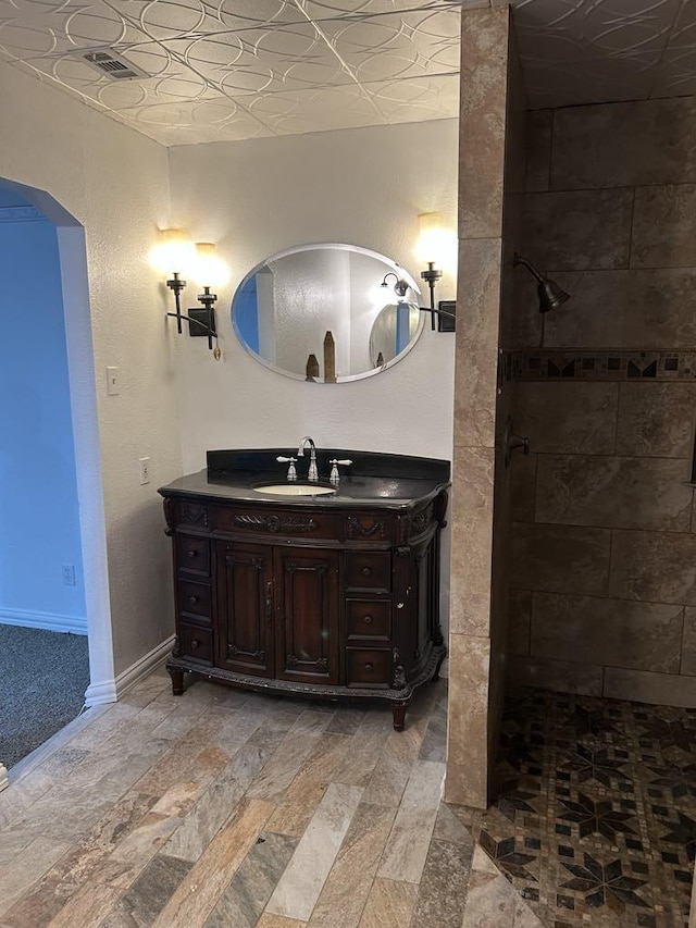 bathroom featuring vanity and walk in shower