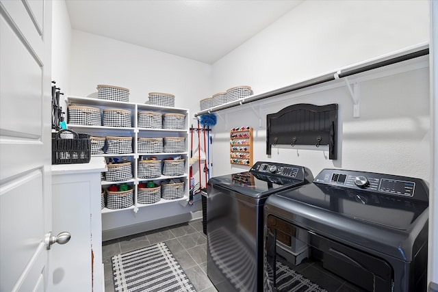 washroom with washing machine and dryer