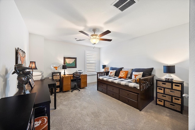 carpeted bedroom featuring ceiling fan