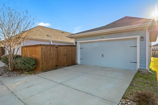 view of side of property featuring a garage