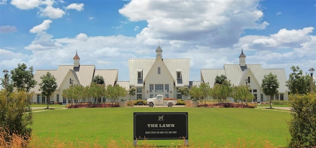 view of home's community featuring a yard