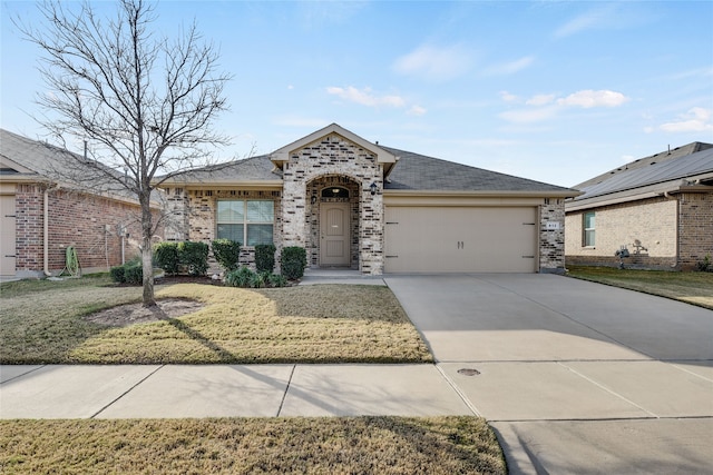 single story home with a front lawn and a garage