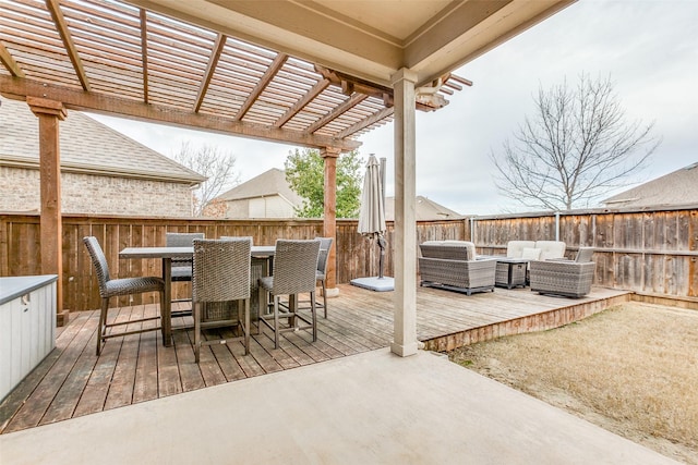 deck with an outdoor living space and a pergola