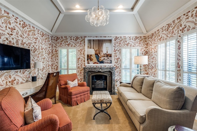 living room with crown molding, a healthy amount of sunlight, vaulted ceiling, and a notable chandelier