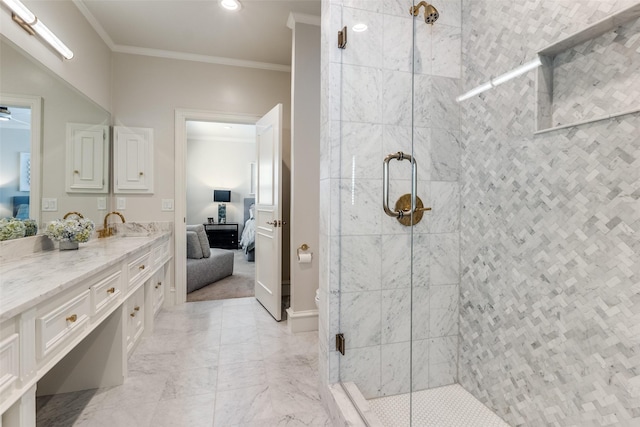 bathroom featuring vanity, crown molding, and a shower with door