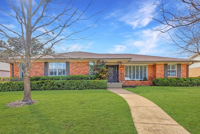 ranch-style house with a front yard