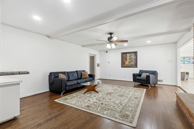 living room featuring ceiling fan, dark hardwood / wood-style flooring, and beam ceiling