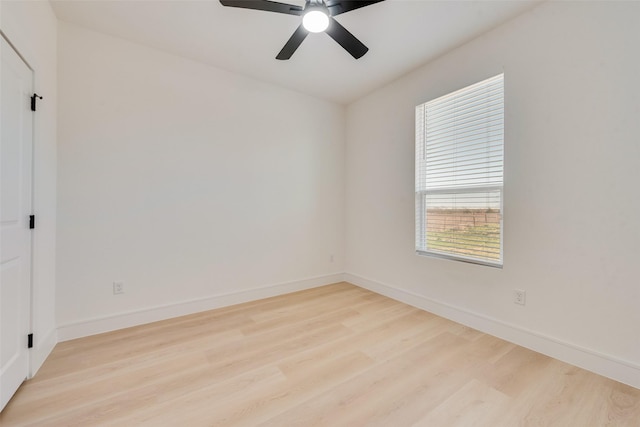 unfurnished room featuring ceiling fan and light hardwood / wood-style flooring