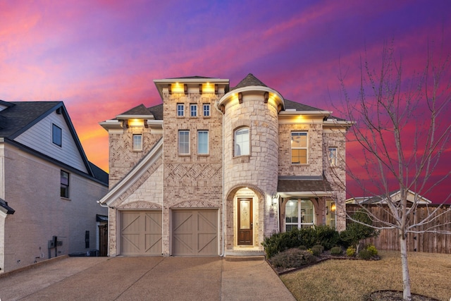 view of front of property featuring a garage