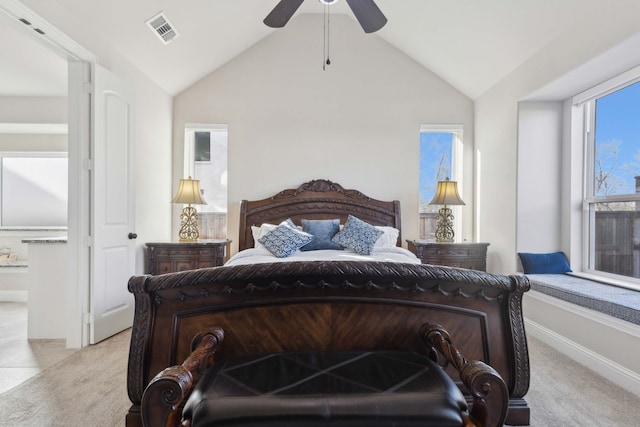 carpeted bedroom featuring ceiling fan and lofted ceiling