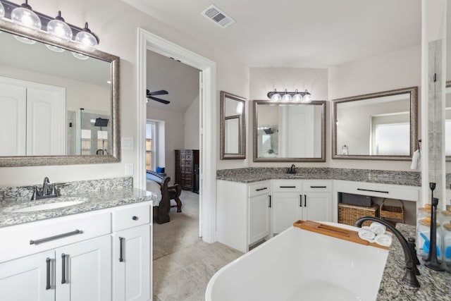 bathroom with tile patterned flooring, vanity, ceiling fan, and independent shower and bath