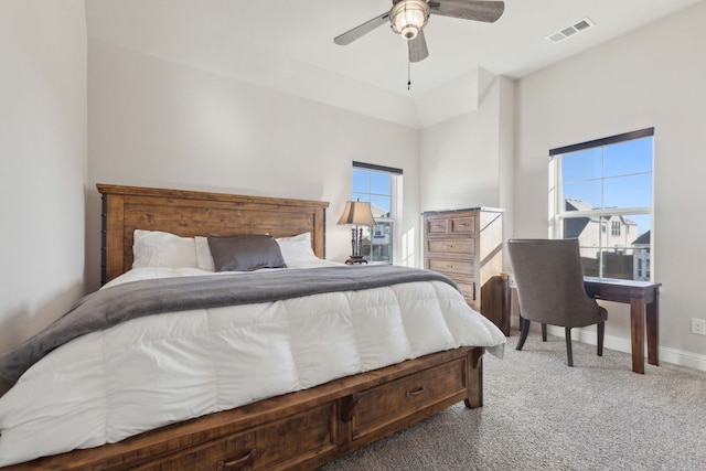 carpeted bedroom with ceiling fan