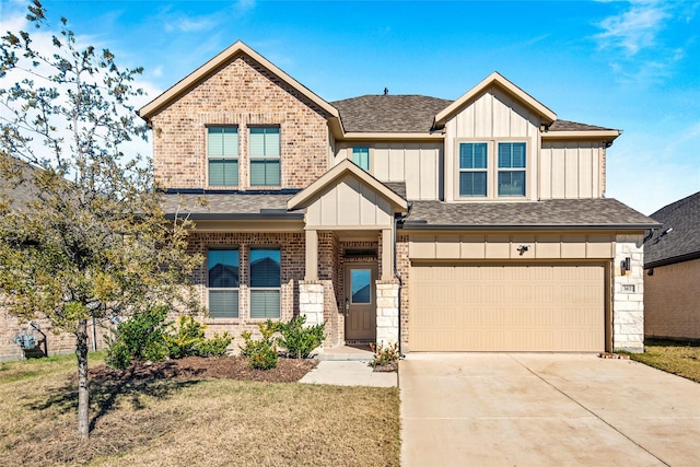 craftsman-style home featuring a garage and a front lawn